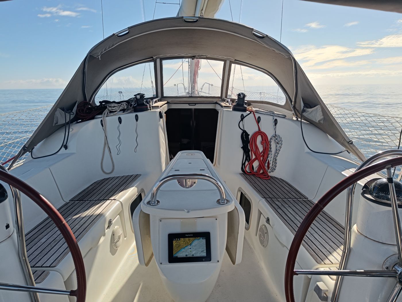 Neptuno, a Beneteau Oceanis 48, sailing off Puerto Banús, Marbella