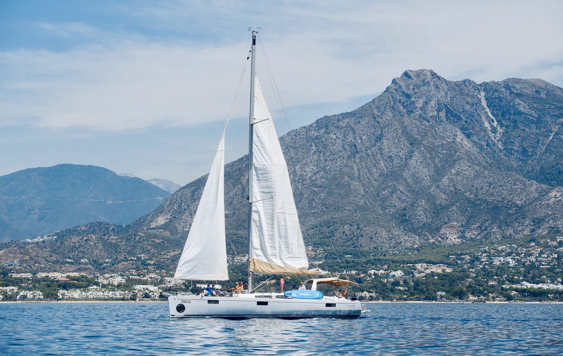 Neptuno, a Beneteau Oceanis 48 flagship sailing yacht, cruising off Marbella