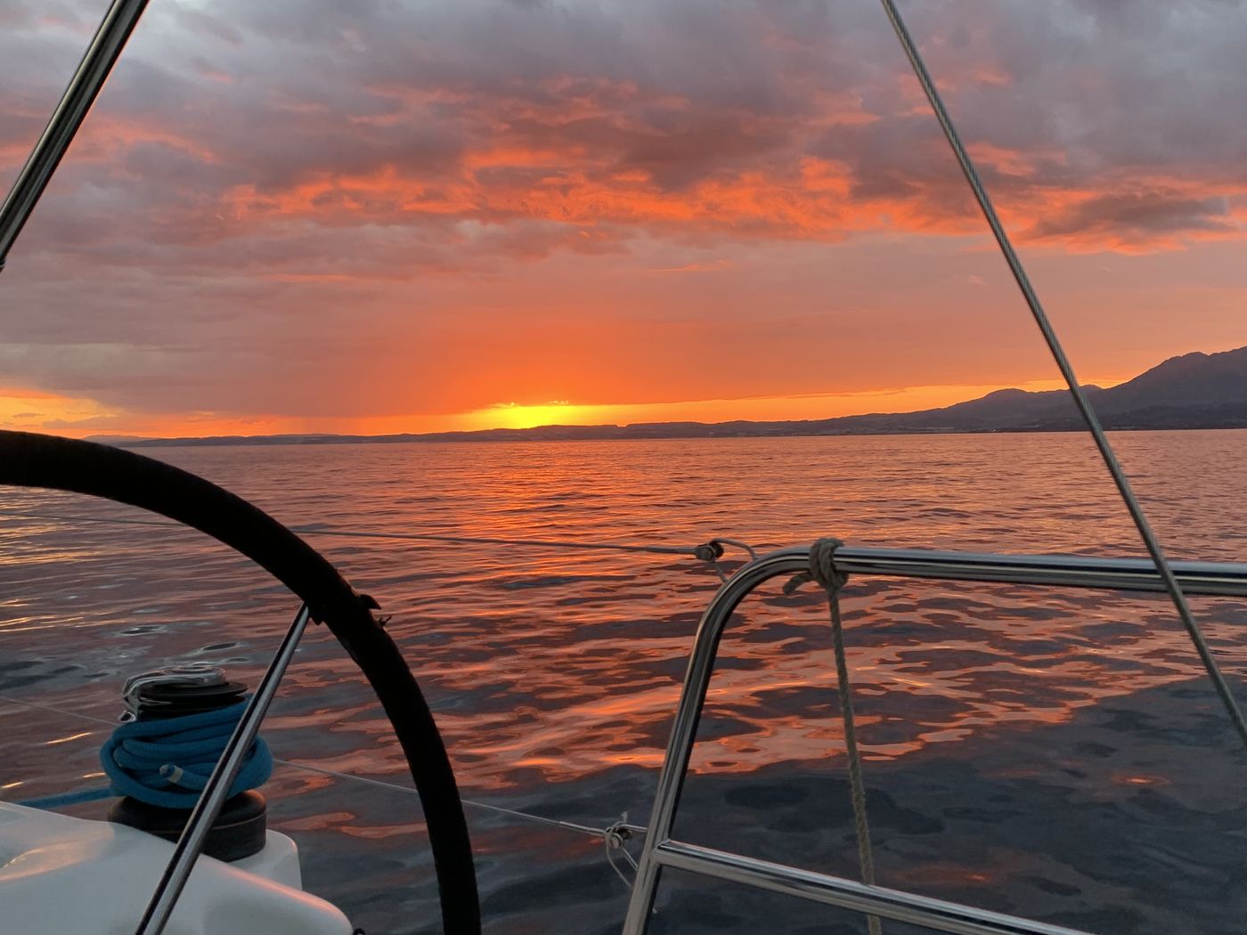 Sailing yacht silhouette at sunset off Puerto Banús, Marbella